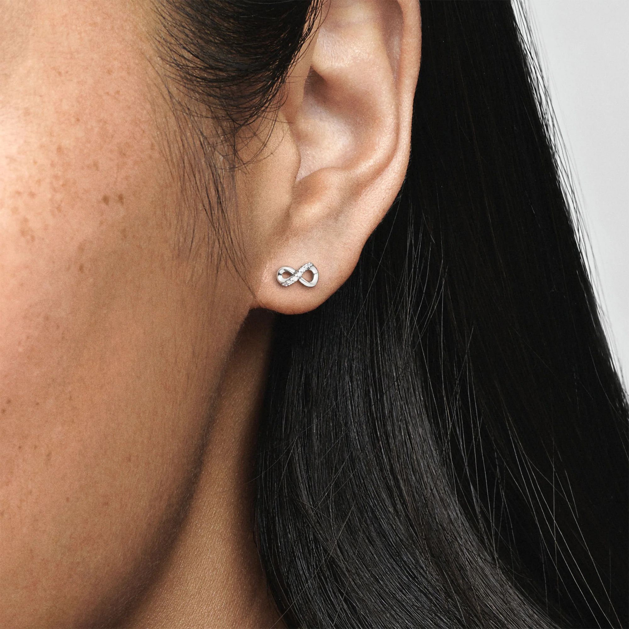 Infinity Sterling Silver Stud Earrings With Clear Cubic Zirconia - Image 4