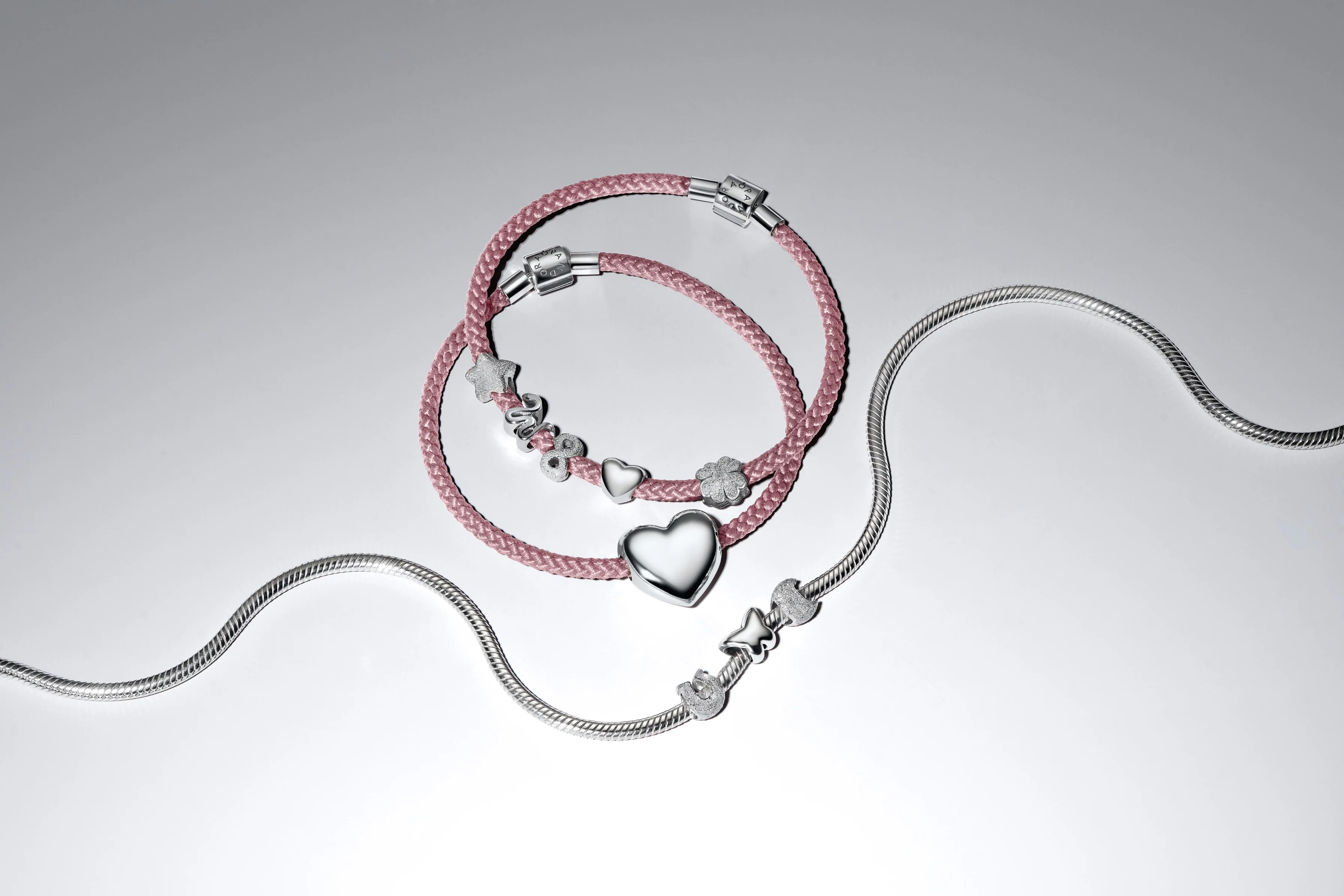 Sterling Silver Bracelet With Shimmering Pink Cord - Image 3