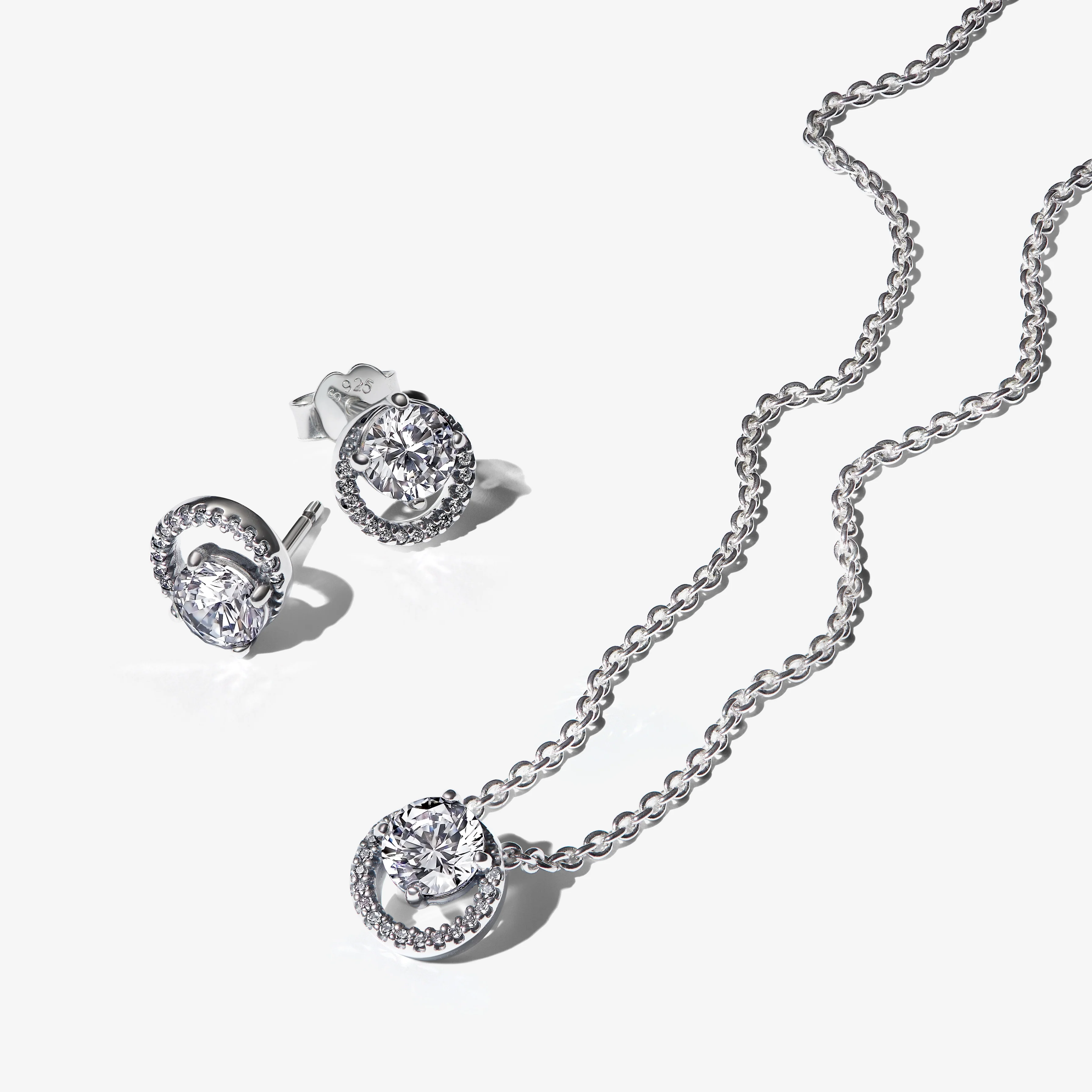 Sterling Silver Stud Earrings With Clear Cubic Zirconia - Image 2